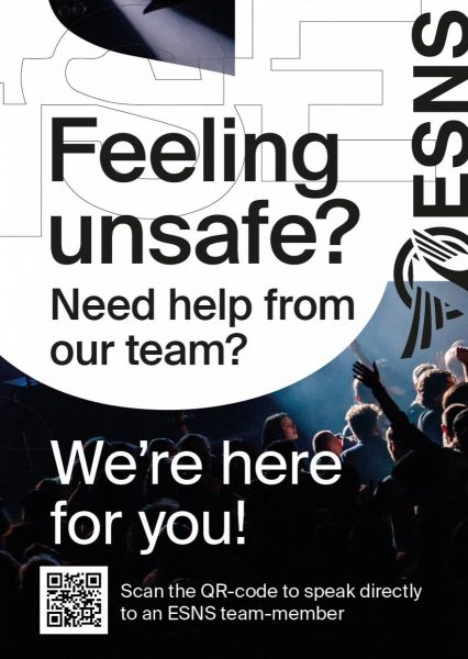 Poster with large text "Feeling unsafe? Need help from our team? We're here for you!" above an image of a crowd at a concert, and a QR code at the bottom for contacting the ESNS team.