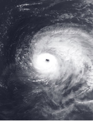 Satellite view of a large hurricane with a clear, well-defined eye surrounded by dense swirling clouds.